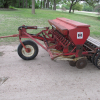 International 100 7ft Grain Drill w/ Grass Seeder