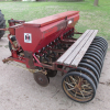 International 100 7ft Grain Drill w/ Grass Seeder